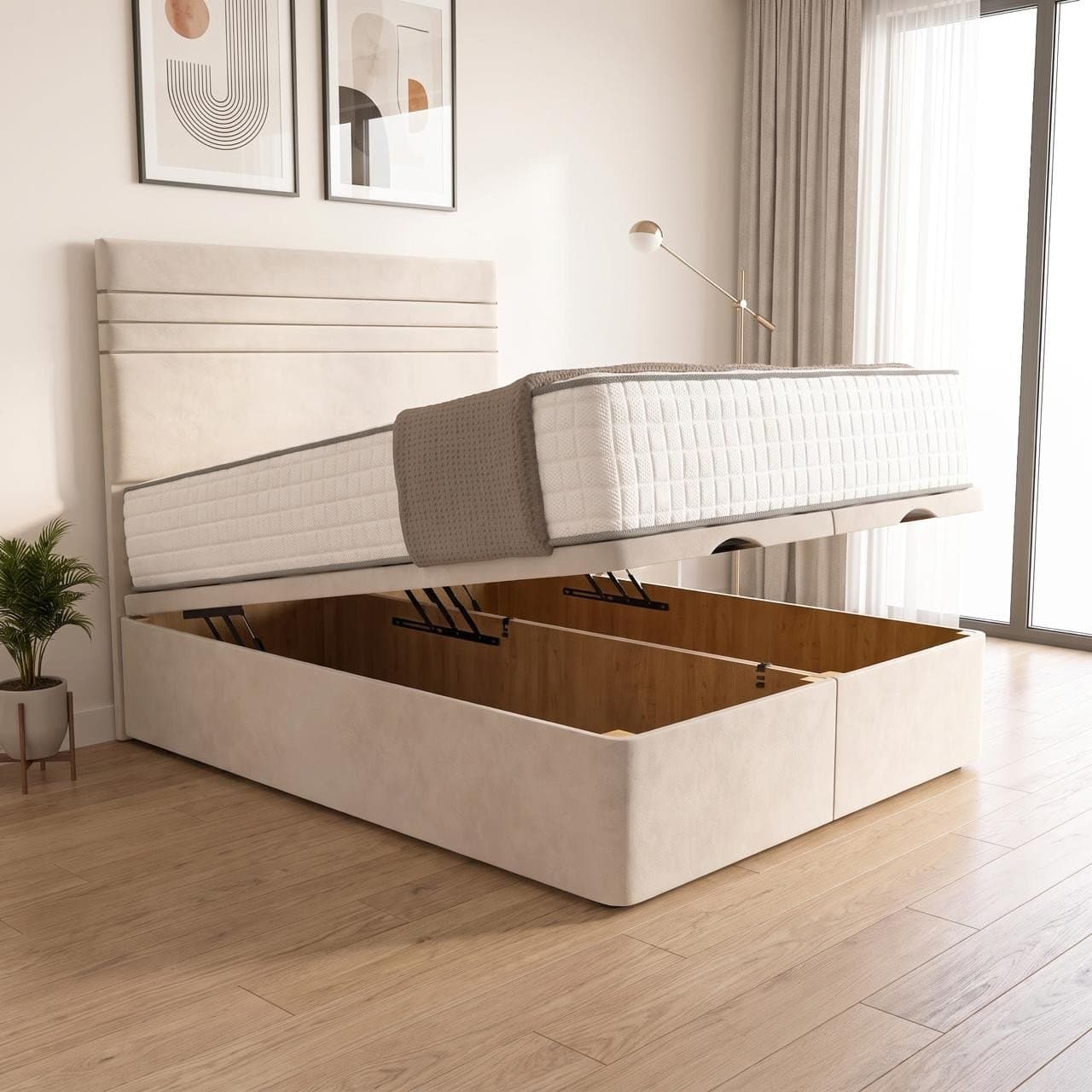 Empire ottoman storage bed in cream with a headboard with horizontal panel bands, base raised to show the full-length storage